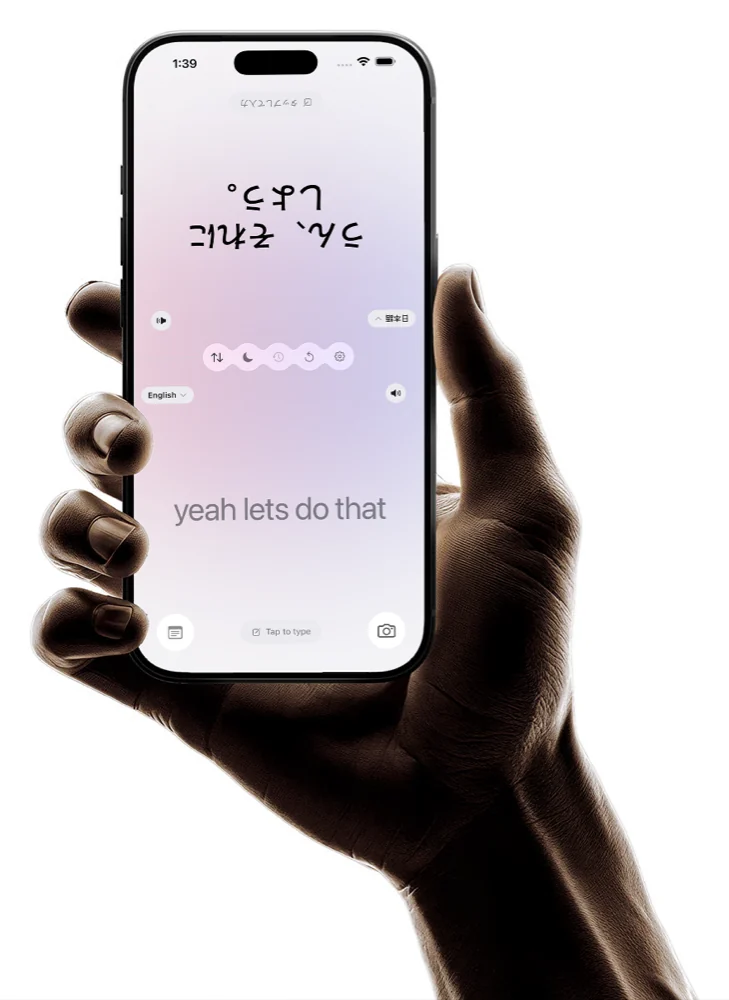 A Better Translate conversation held in one hand. The far half of the screen is upside down, facing the person across from you.